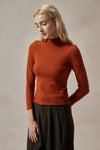 burnt orange turtleneck